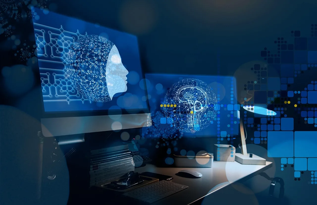 deux écrans montrant une tête cyber représentant l'IA